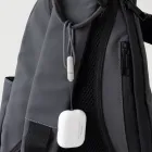 Fone de Ouvido Bluetooth preso na mochila