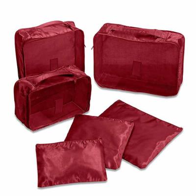 Kit necessaire com 6 peças confeccionadas em nylon vermelho