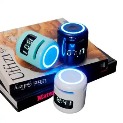 Caixa de som multimídia e relógio despertador