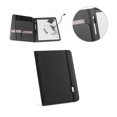 O interior contém vários bolsos, suporte para esferográfica (não inclusa) Contém caderno com 40 p...