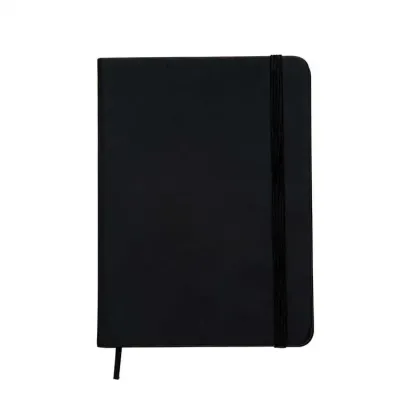 Caderneta preta com pauta