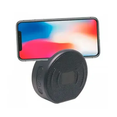 Caixa de som portátil com porta celular