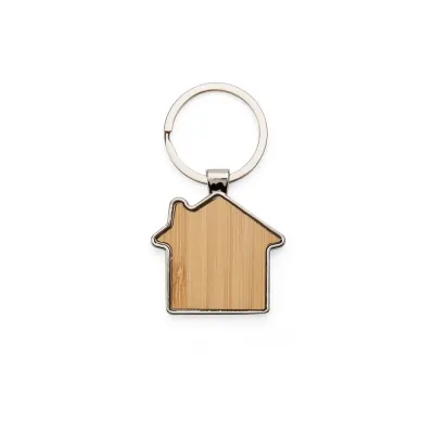 Este chaveiro de metal no formato de uma casa combina resistência e elegância, com frente em deta...