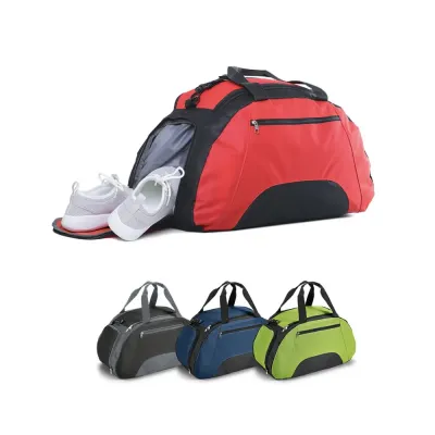 Bolsa esportiva em 600D com divisória interior e fundo com placa semi-rígida. Bolso frontal e bol...