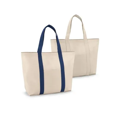 Sacola 100% algodão canvas (280 g/m²) com bolso frontal e bolso interior com zíper. A sacola cont...