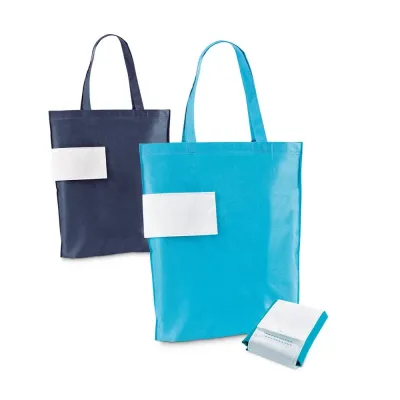 Sacola dobrável em non-woven (80 g/m²) com alças de 50 cm. Fornecida desdobrada. Dobrado: 110 x 1...