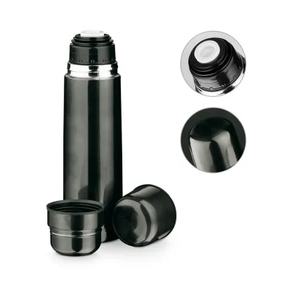 Garrafa em aço inox com parede dupla isolada a vácuo (térmico). Capacidade até 750 mL. Inclui 2 c...